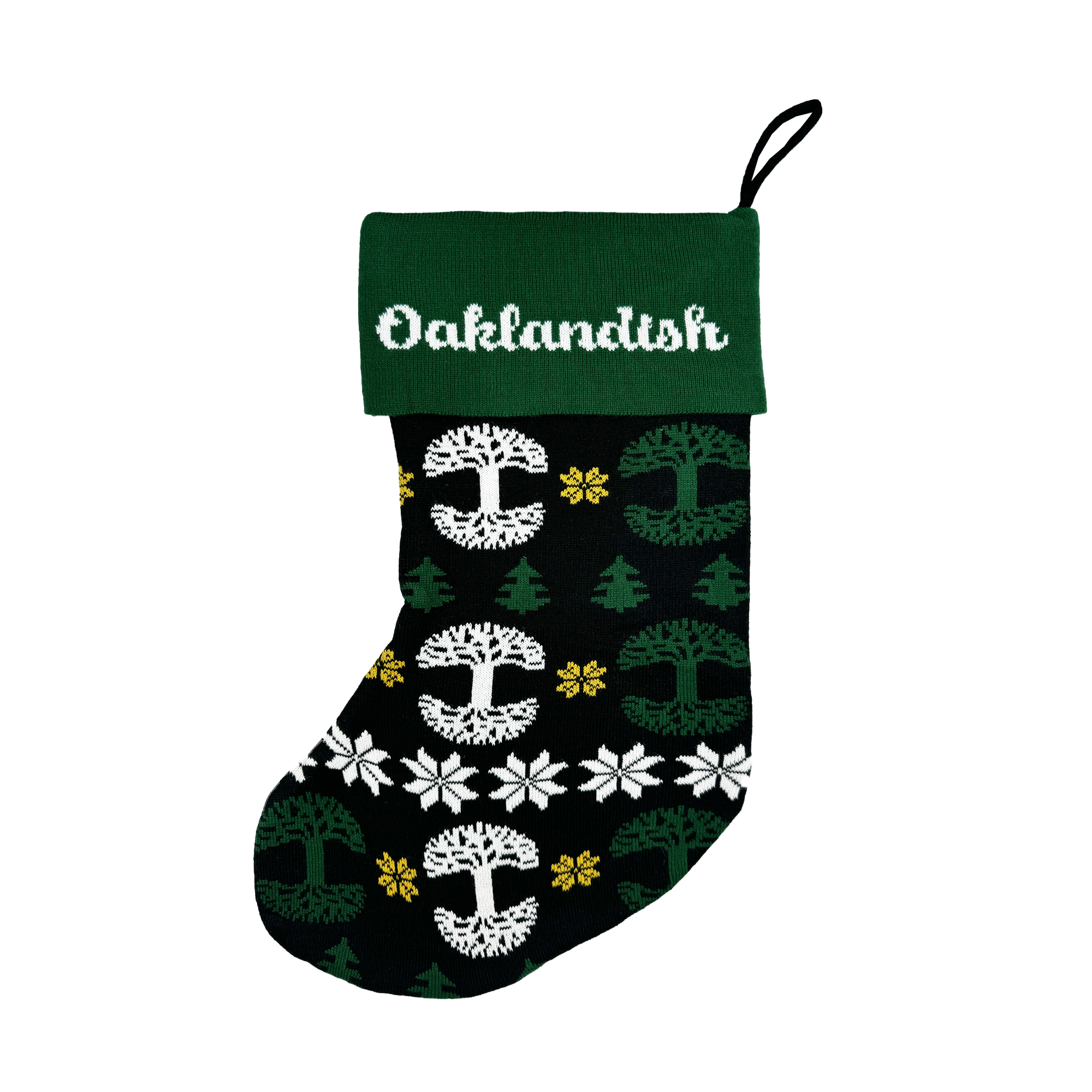 The Oaklandish 2024 Holiday Stocking, made from sturdy acrylic, boasts a green cuff with "Oaklandish" emblazoned in white. Its black body is adorned with a charming pattern of white and small green trees, snowflakes, and yellow symbols. This distinctive piece includes a convenient black loop for hanging.