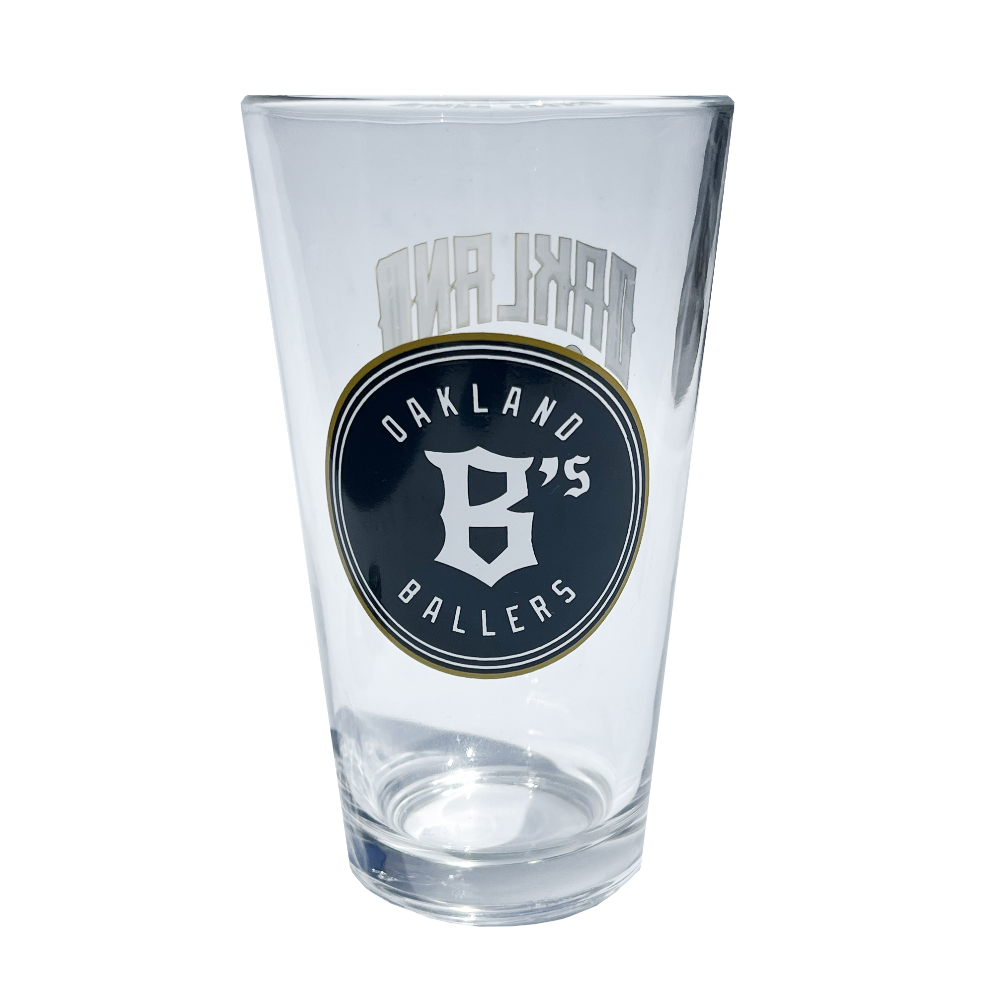 Angled image of pint glass with Oakland Ballers baseball logo in green and gold.