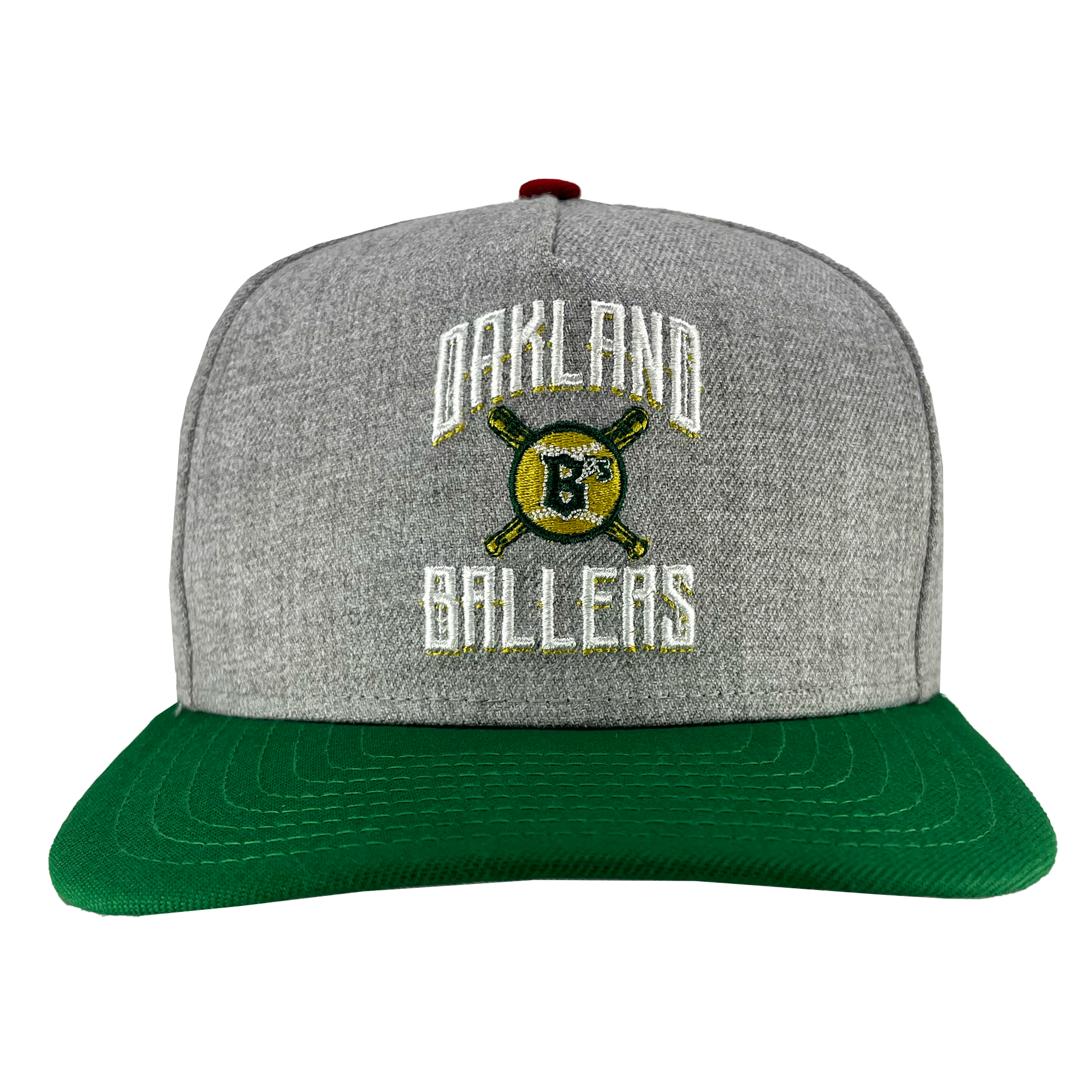 Introducing the New Era Oakland Ballers Alt Logo 9FIFTY AF Cap: This stylish cap features a gray body with a green brim and showcases "Oakland Ballers," Oakland's New Pro Baseball Team, embroidered in white on the front. The design includes an intricate bear mascot with two crossed baseball bats behind it, capped off with a distinctive red button on top. Brought to you by Oakland Ballers.