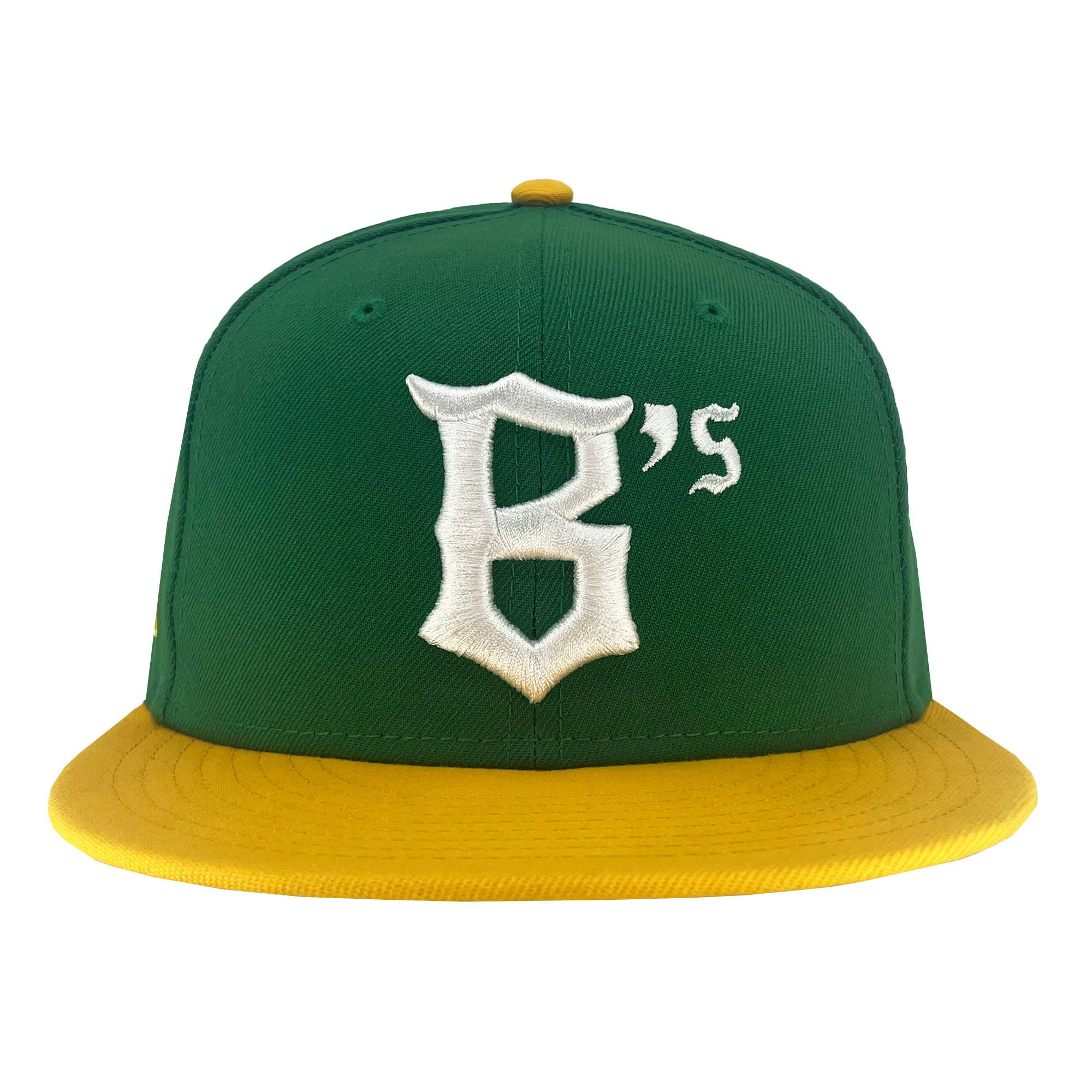 A New Era Oakland Ballers 9FIFTY Cap is shown, featuring a green body with a bright yellow flat brim and a yellow button on top. The cap prominently displays an embroidered white "B" followed by the smaller letter "s" on the front, representing the Oakland Ballers from the Pioneer League.