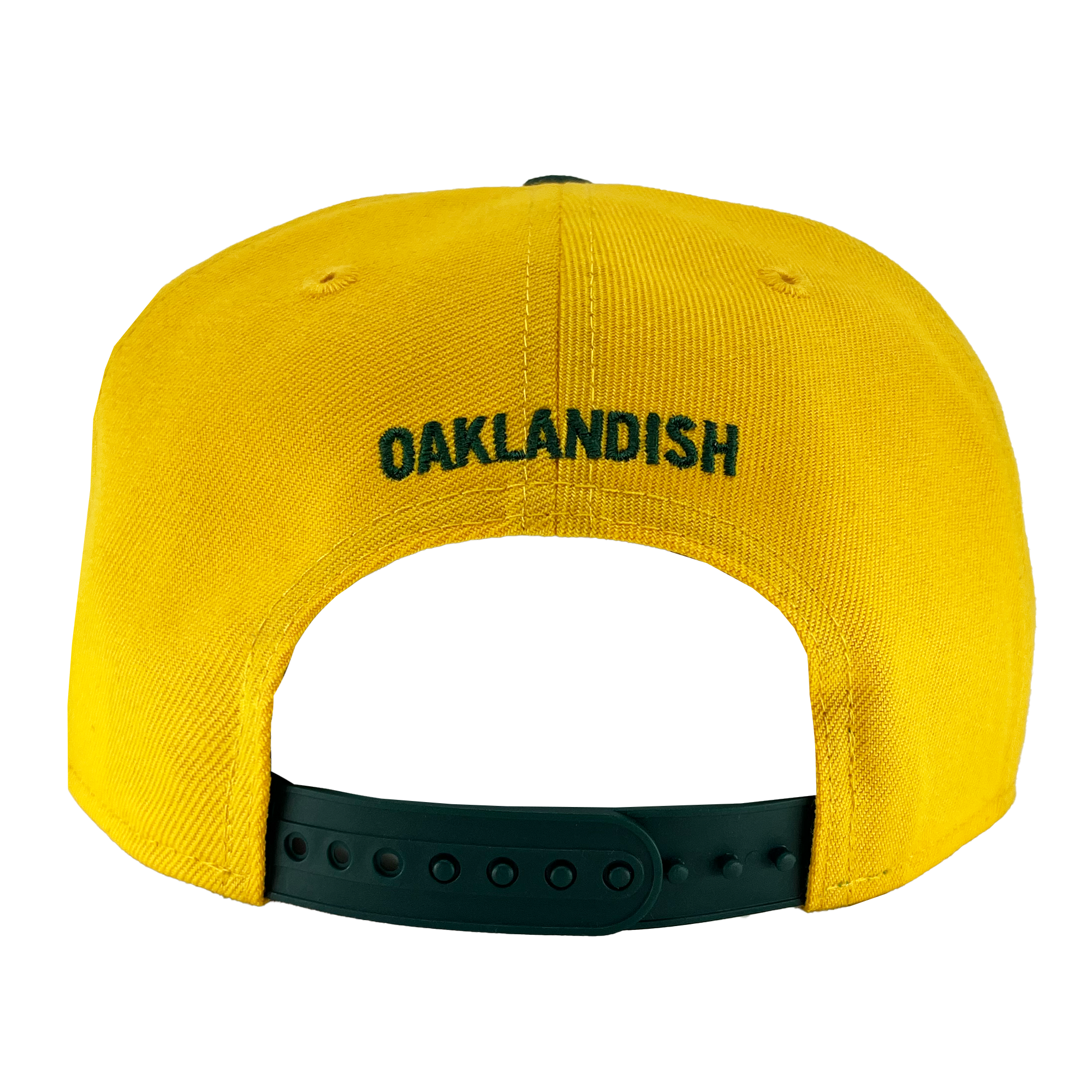 The New Era Oakland Ballers 9FIFTY Cap is displayed from the back, showcasing green adjustable snapback straps and the word "OAKLANDISH" embroidered in green. The yellow cap embodies the spirit of the Oakland Ballers and is set against a white background.