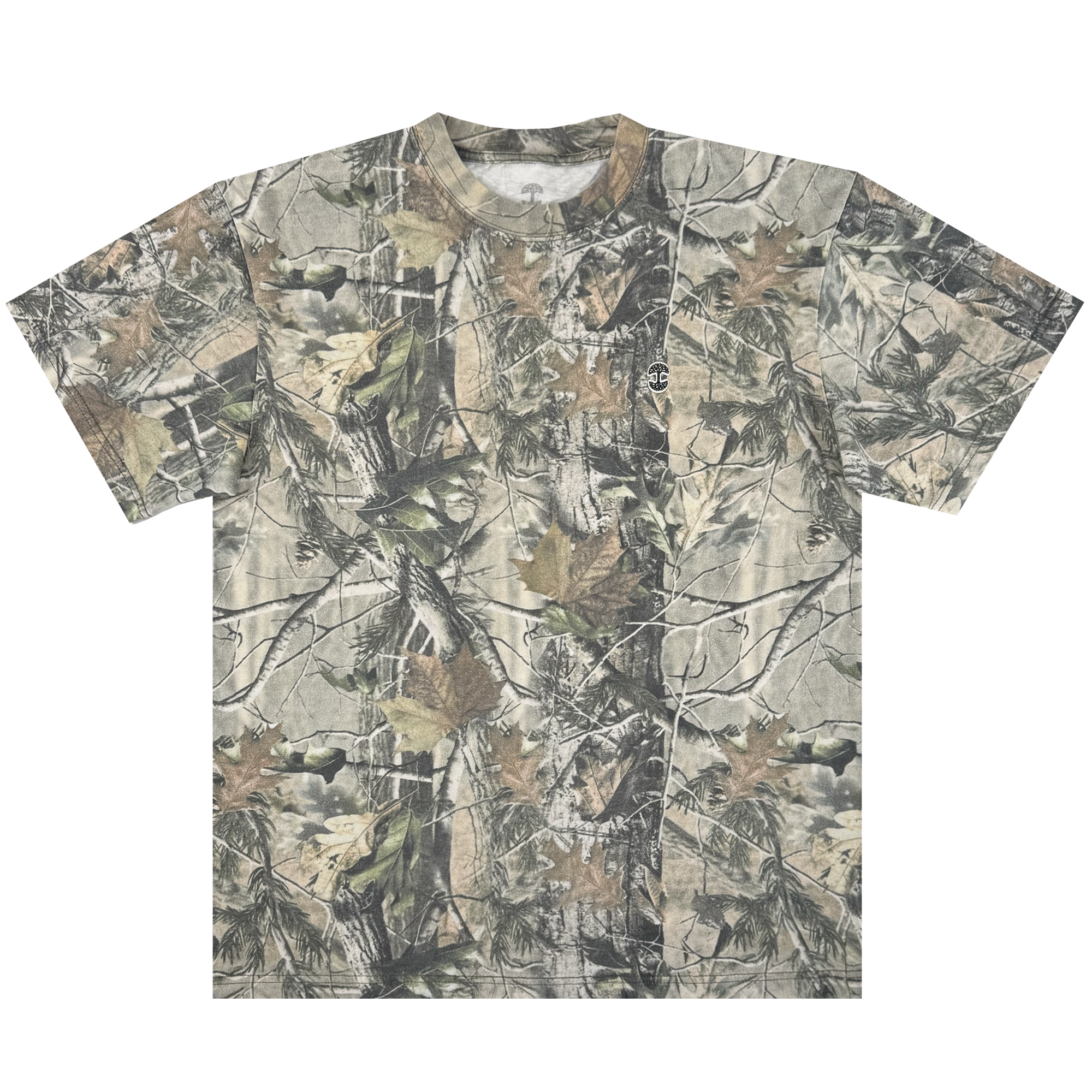 The Oaklandish Camo Tree Tee by Oaklandish is an oversized fit t-shirt with a Tree Camo pattern featuring green, brown, and tan leaves and branches. Made from heavyweight cotton, it boasts a full coverage woodland theme across the shirt, including sleeves and neckline.