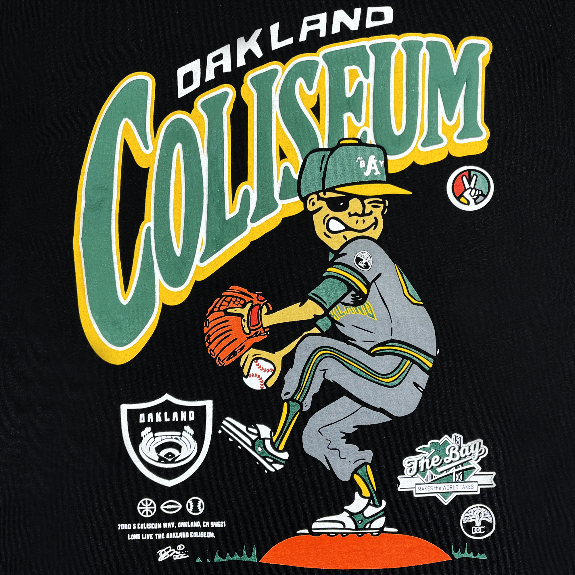 An illustration of a character in an Oakland Athletics uniform pitching a baseball is featured prominently on the Coliseum Tee By DOC from Oaklandish. "Oakland Coliseum" stands out above, bearing the artistic touch of Dustin O. Canalin. Below, various logos and the text "The Bay" and "7060 S. Legend Way, America, CA 94621 Long Live the Coliseum" are showcased in vibrant green, yellow, and red hues.