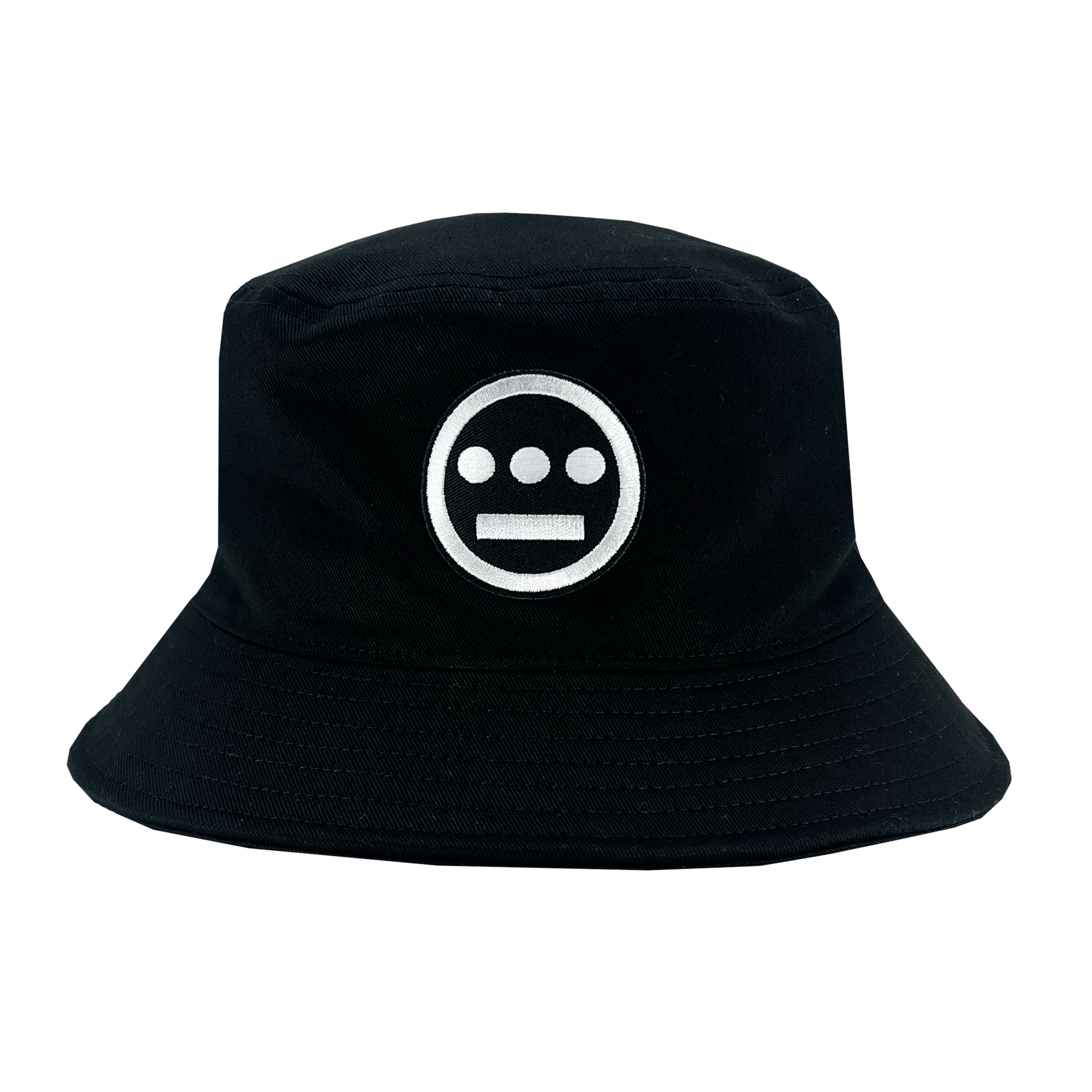 The Hiero Bucket Hat by Hieroglyphics is a black bucket hat featuring a white stitched logo on the front. The logo, reminiscent of ancient hieroglyphics, consists of a circle with three horizontal dots near the top and one horizontal line with three more dots below it, resembling a face. The hat also has a downward sloping brim.