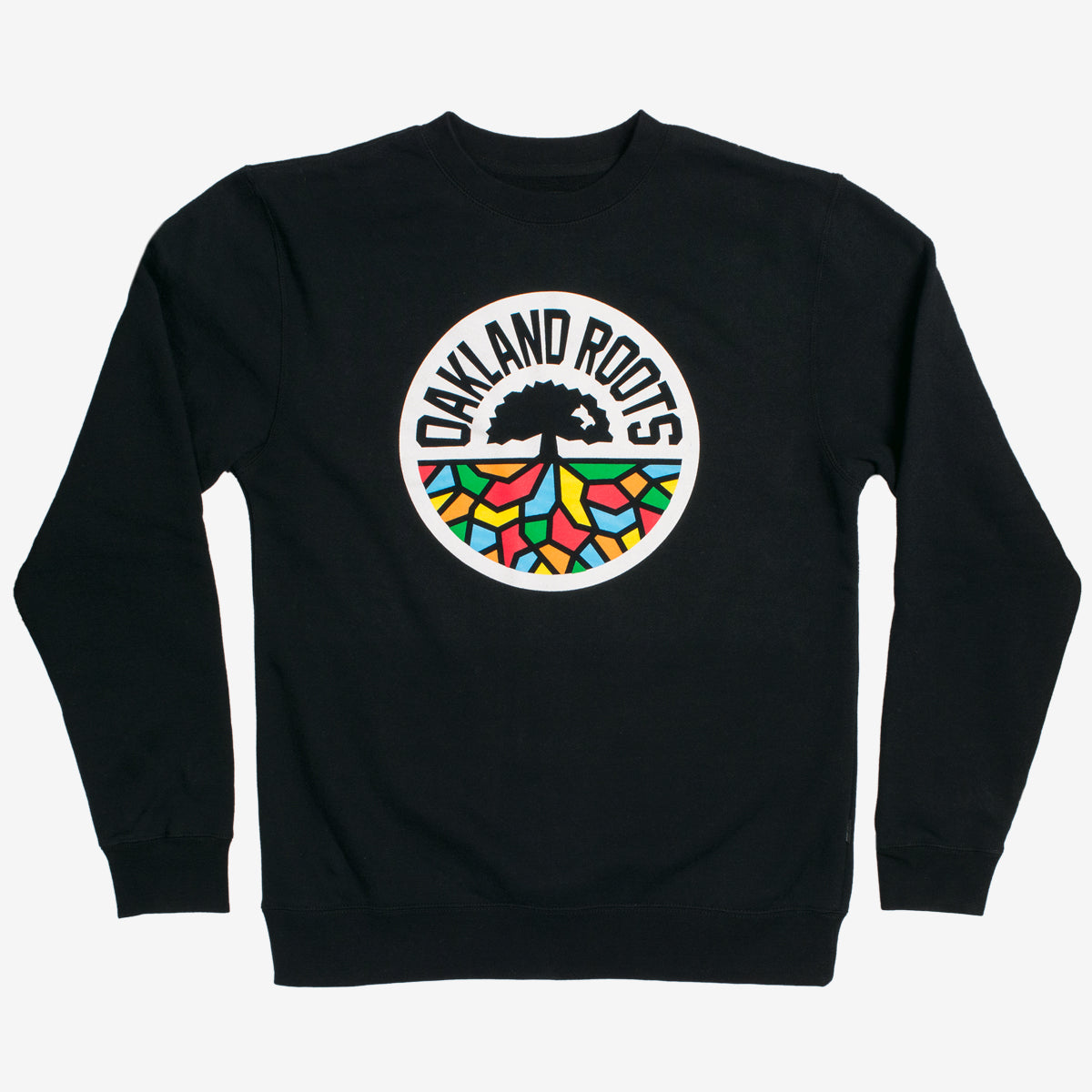 Full-color ROOTS SC mosaic circle logo on the chest of a black crew neck sweatshirt.