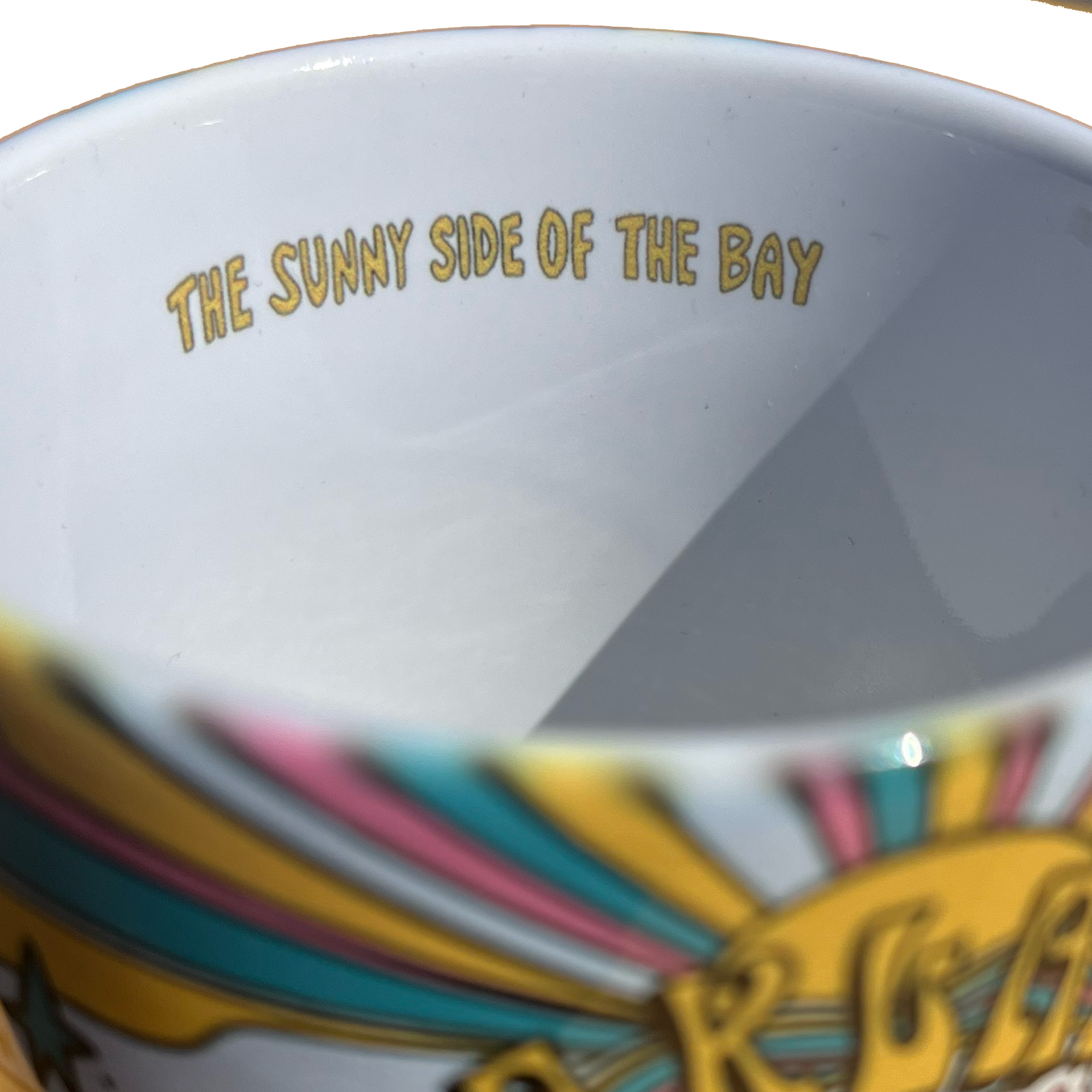 Inside view Oakland Dream mug with Oakland dream all over print and C handle and 'The sunny side of the bay' text.