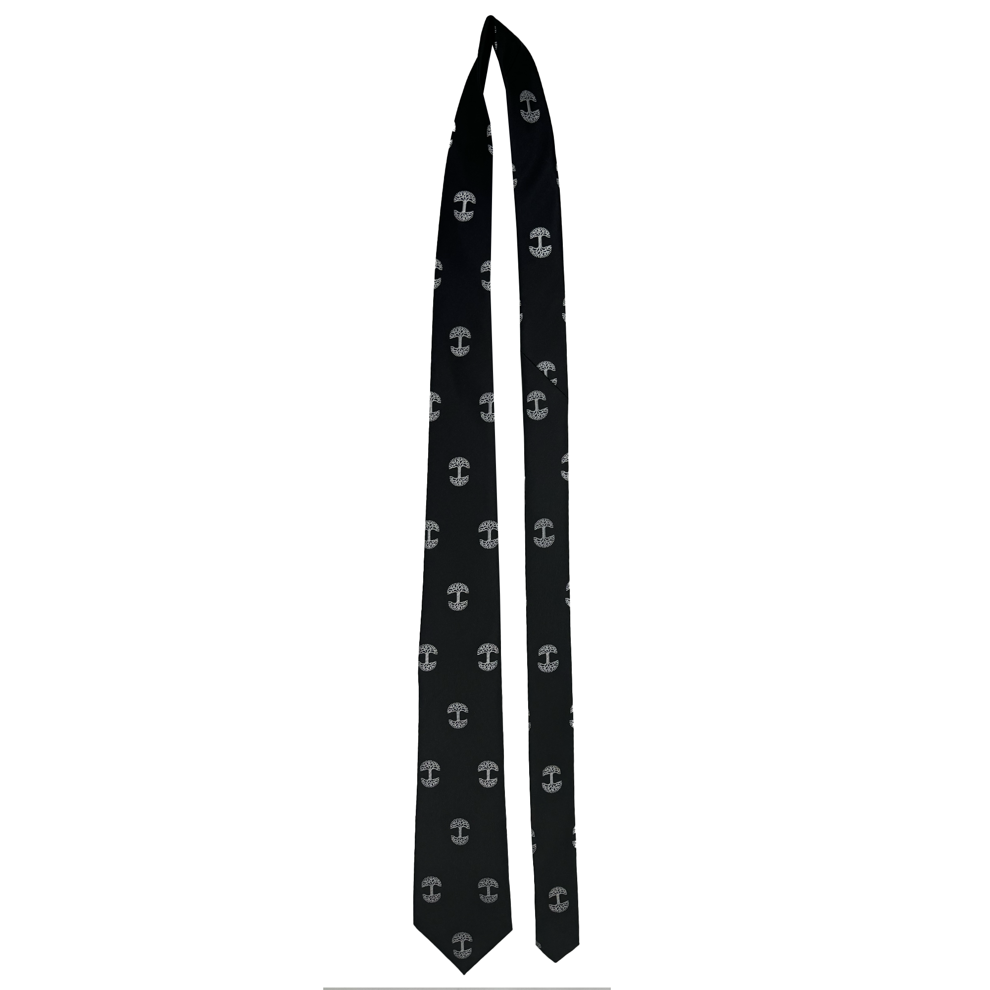 The Oaklandish Logo Tie features a sleek polyester construction with a black base and an evenly spaced pattern of white anchors. This stylish accessory from Oaklandish is displayed flat on a white background, highlighting its full length and nautical design.