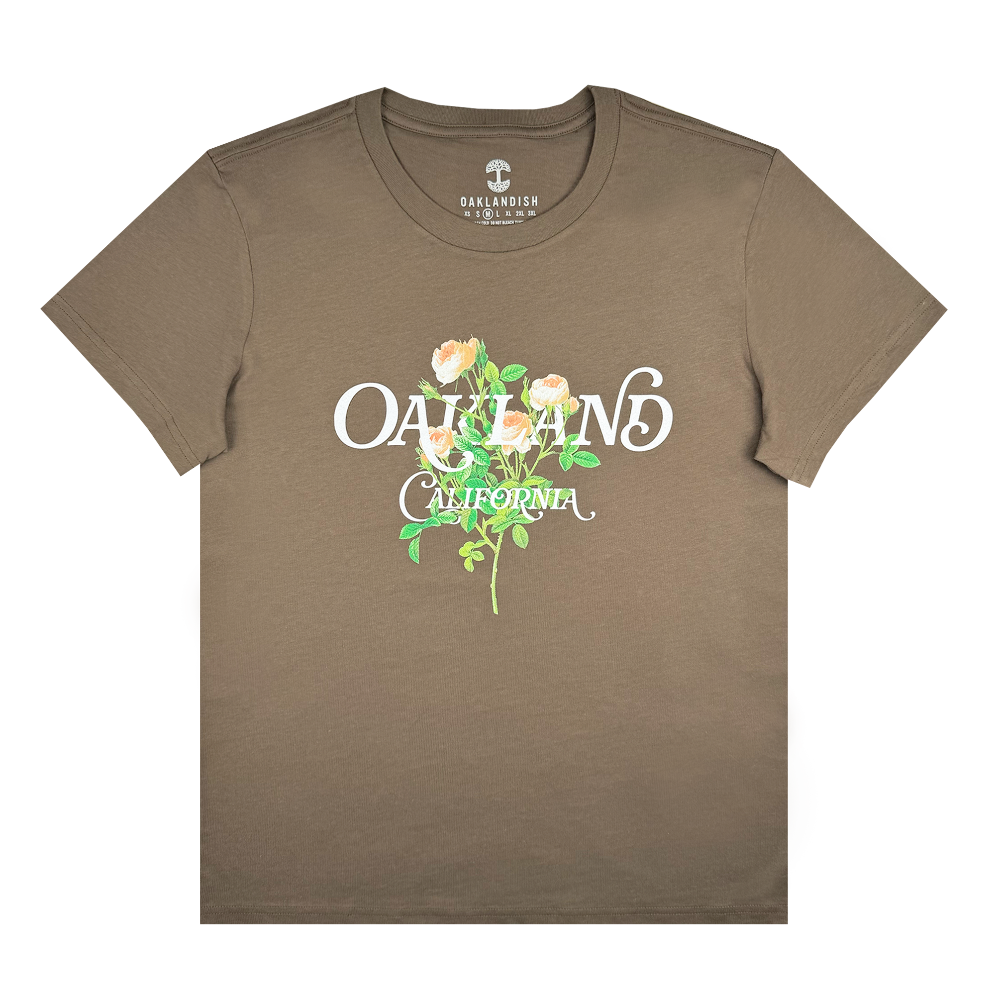 The Women's Posy Tee by Oaklandish is a brown T-shirt made from 100% cotton, featuring a design of a green plant with yellow flowers. The phrase "OAKLAND CALIFORNIA" is printed in white, with "OAKLAND" standing out in bold. The shirt is designed in a classic fit for women's sizing, and has the brand name "Oaklandish" subtly placed inside the collar.