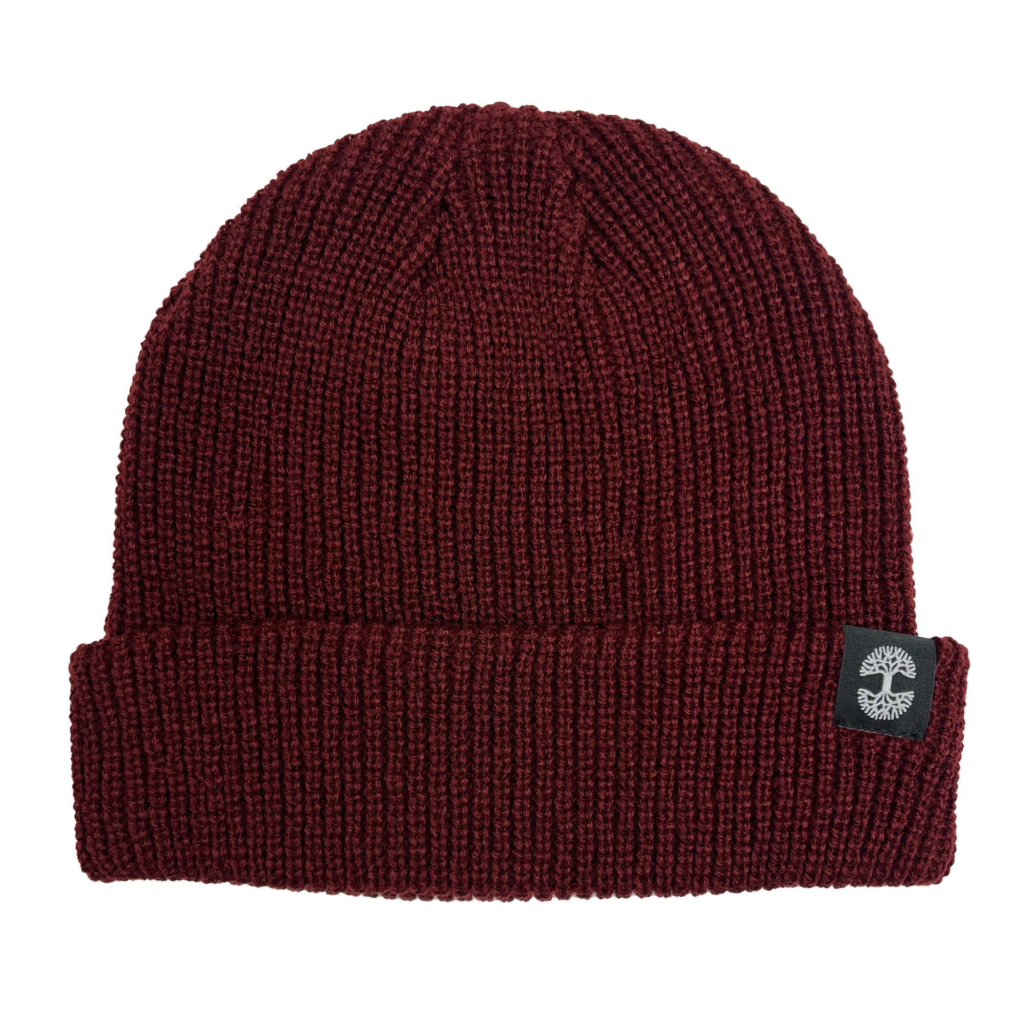 The Ramos Beanie by Oaklandish is a maroon knit headwear accessory featuring a folded cuff. Made from woven acrylic, it boasts a ribbed texture and includes a small black patch on the cuff adorned with a white circular emblem. The emblem showcases a pattern resembling intertwined strands, adding a touch of style to this beanie.