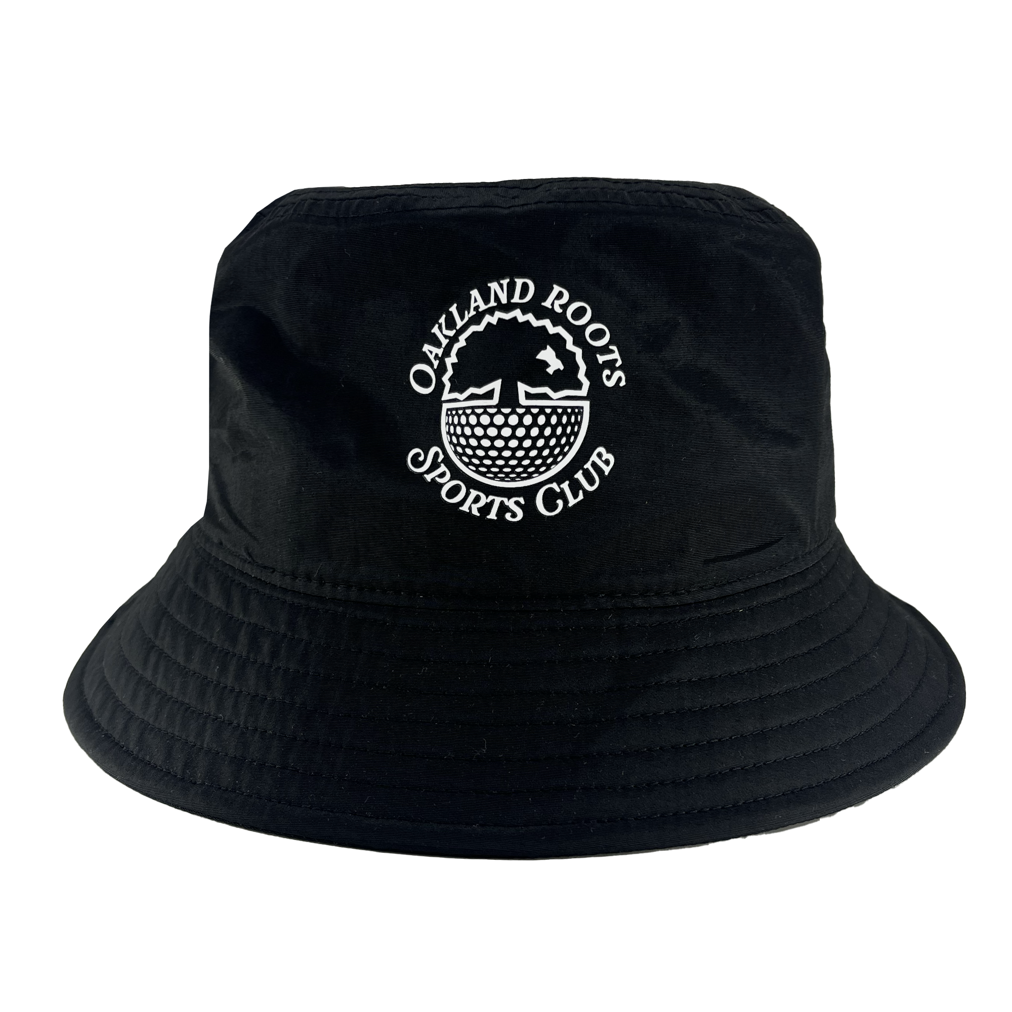 The Heritage Bucket Hat by Oakland Roots SC is a black bucket hat featuring white embroidered text and logo on the front. The text reads "OAKLAND ROOTS SPORTS CLUB," encircling a stylized tree and roots design in a circular emblem. Designed to promote social good, the hat includes a downward-sloping brim with visible stitching along the top and brim.