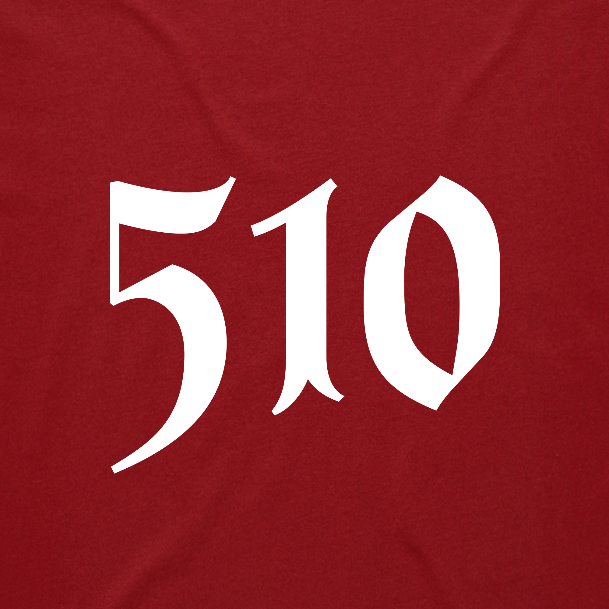 The image displays "510" in a bold, stylized white font on a textured dark red background. The digits have a gothic look with sharp edges and decorative serifs, resembling the elegance of the Sistrurus Tee by Oaklandish that blends style and comfort.