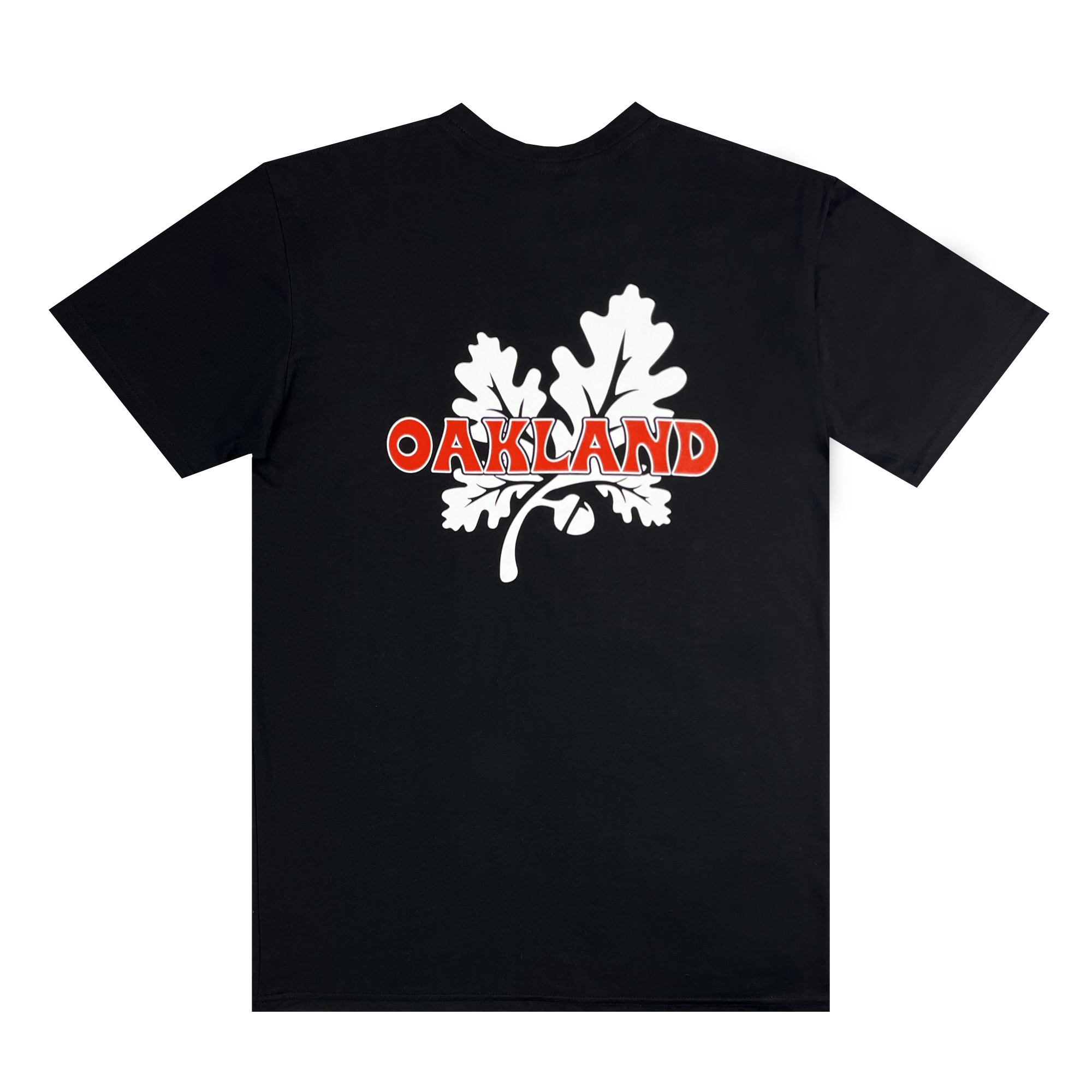 The Grocery Run Tee by Oaklandish is a black t-shirt featuring a prominent white oak leaf graphic on the back. The word "OAKLAND" in bold red, outlined with white, is displayed across the leaf. This 100% cotton, classic fit t-shirt is laid flat, with sleeves and detailing clearly visible, set against a plain white background.