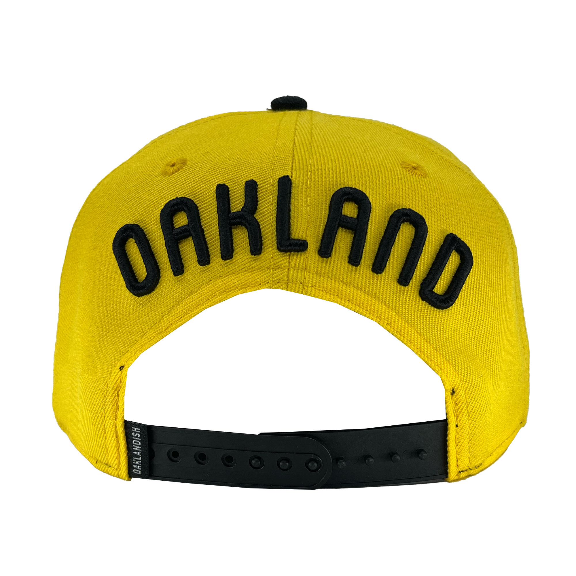 Back view of yellow snapback hat with 'Oakland' text above arch and oaklandish woven label near black plastic closure.