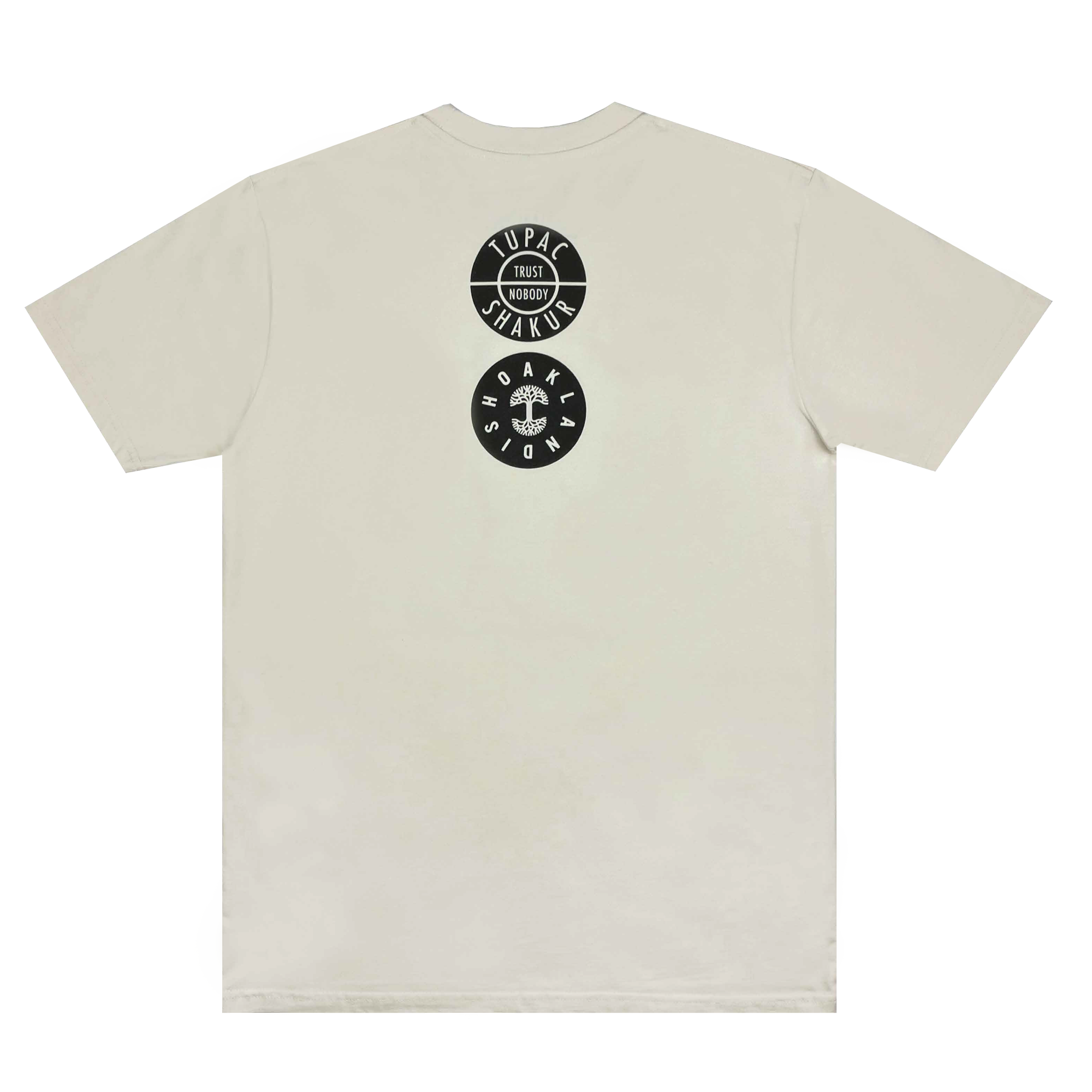 Introducing the Wavy Tupac Tee by Oaklandish: This beige T-shirt showcases black circular logos on the back, with "Tupac Shakur" at the top and "Trust Nobody" prominently displayed in the center. The bottom logo reads "Makaveli," celebrating him as the "King of Oakland." A must-have for every hip-hop enthusiast.