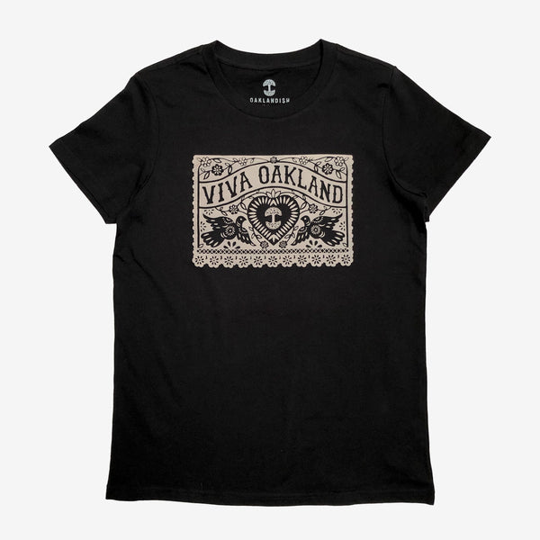 OAKLAND, United States - Women show a T-shirt with the image of